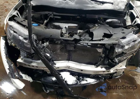 2022 Honda Passport Elite z USA, uszkodzony, nr VIN 5FNYF8H07NB003488